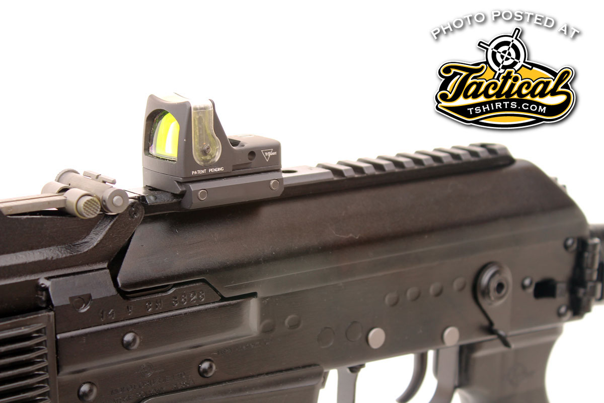 A synthetic Picatinny-type rail runs the full length of the receiver cover making it easy to mount a red dot sight.