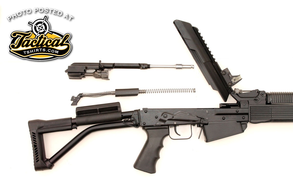 The Vepr-12 is as simple to take down as any AK. Tip up the receiver cover then remove the recoil spring and the bolt/piston unit to clean the bore and flush the hammer/trigger mechanism.