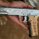 14 shot, engraved, double-stack, Khyber Pass copy of a Tokarev pistol. Made in Pakistan.