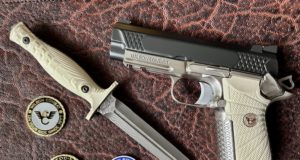 POTD - Wilson Combat EDC X9 with white grips. Knife made by Les George.