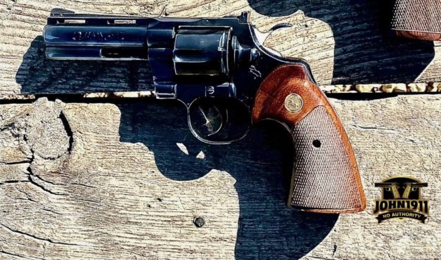 Colt Python Revolver goes down.